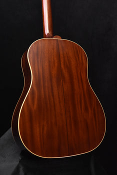 acoustic guitar back with central seam and gold edge binding