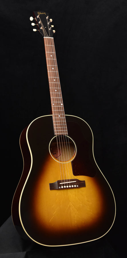 Vintage J-45 acoustic guitar with sunburst finish, black pickguard, six-string