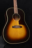Vintage J-45 acoustic guitar with sunburst finish and black pickguard, six-string