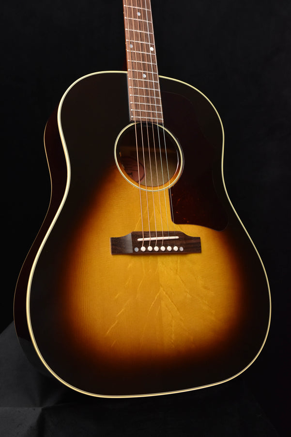 Vintage J-45 acoustic guitar with sunburst finish and black pickguard, six-string