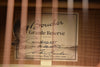 Grand Reserve series label on acoustic guitar case backing with model information