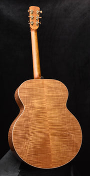 acoustic guitar back with warm natural wood tone and smooth arched body