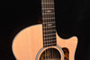 Acoustic guitar neck and upper body with fretboard markers and soundhole rosette