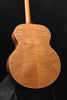 Acoustic guitar back view with figured wood grain texture