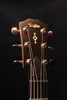 Acoustic guitar headstock with Taylor logo and tuning pegs