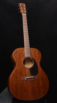 martin acoustic guitar with sunburst body and soundhole, steel-string bridge