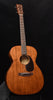 Martin acoustic guitar with natural wood finish and round sound hole