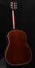 Acoustic guitar back in dark wood with cream binding along the body