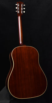 acoustic guitar back in dark wood with cream binding along the body
