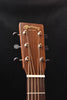Martin acoustic guitar headstock with logo and tuning pegs