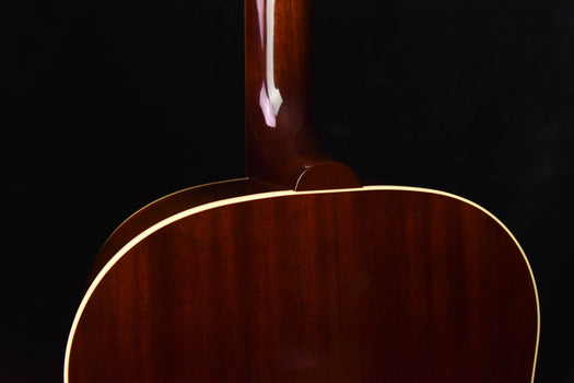 acoustic guitar neck joint above the soundboard with glossy dark wood finish