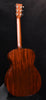 Retro Plus guitar back view with warm mahogany wood grain and headstock