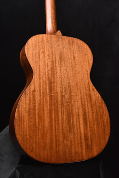 martin acoustic guitar back close-up with textured wood grain