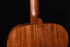 Martin acoustic guitar top shoulder close-up with carved wood edge