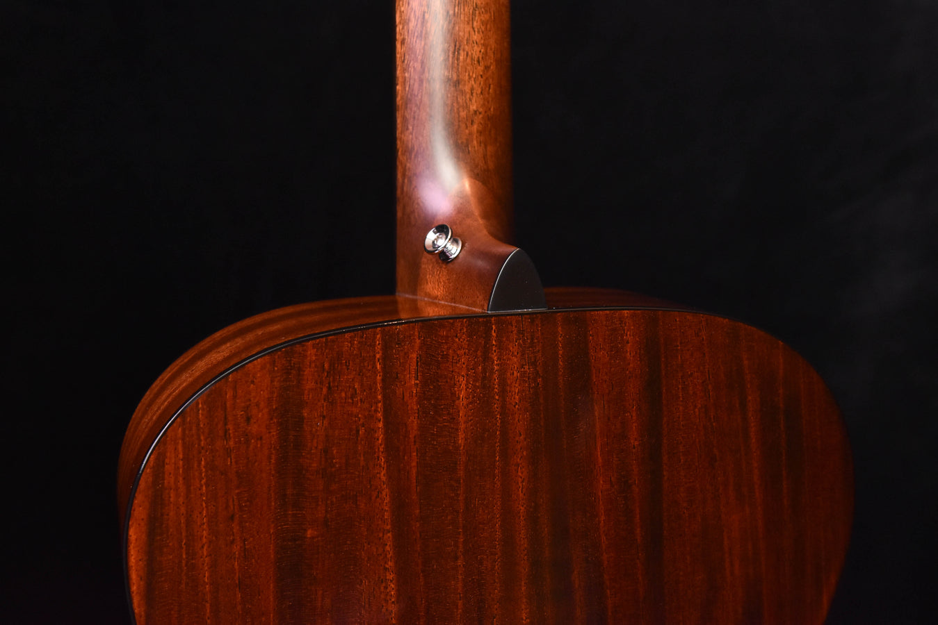 Retro Plus guitar back close-up near neck joint and shoulder with wood grain