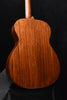Martin acoustic guitar back view with smooth wood grain and rounded shoulders
