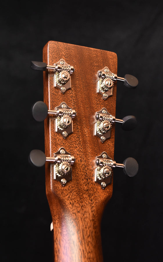 Martin acoustic guitar headstock back with tuning pegs and screws