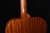 Martin acoustic guitar side near neck joint, showing curved body profile
