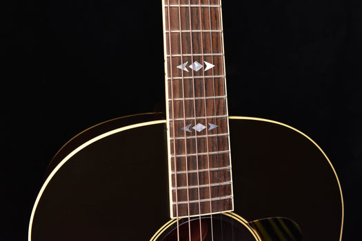 acoustic guitar neck with diamond fretboard inlays and tuning headstock