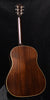 Acoustic guitar back with curved shoulders and gold-edged binding