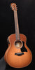 Taylor GS Mini-e Honeyburst acoustic-electric guitar, front view with sound hole and bridge