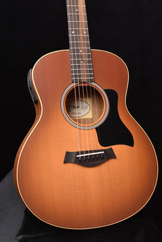 taylor gs mini-e honeyburst acoustic-electric guitar, close-up of sound hole and pickguard