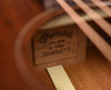 Martin&Co. model label on the guitar soundboard with printed serial number