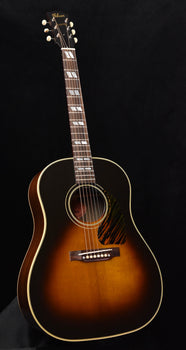 gibson southern jumbo acoustic guitar with sunburst finish, tortoiseshell pickguard, and fretboard