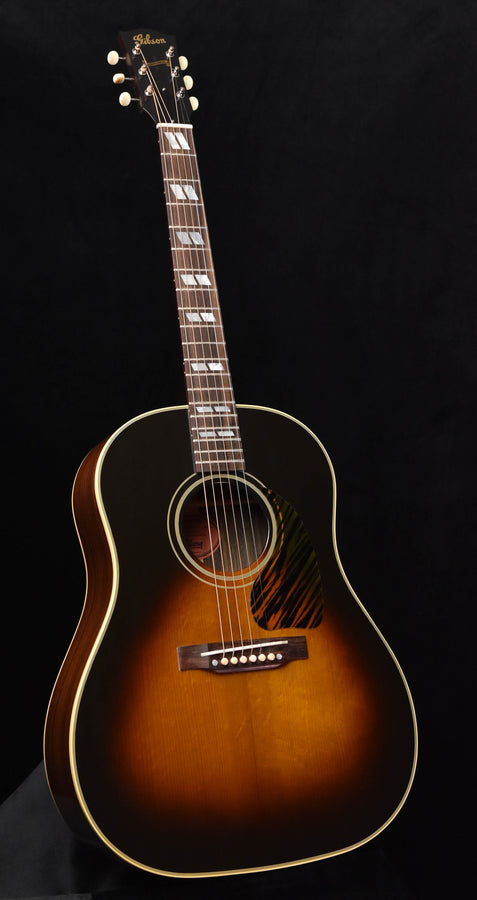 Gibson southern jumbo acoustic guitar with sunburst finish, tortoiseshell pickguard, and fretboard