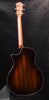 Dark sunburst acoustic guitar with glossy finish, back binding, and headstock.