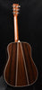 Martin HD-35 acoustic guitar back view with natural binding and wood grain