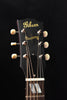 Gibson acoustic guitar headstock with Grover-style tuners and Gibson logo