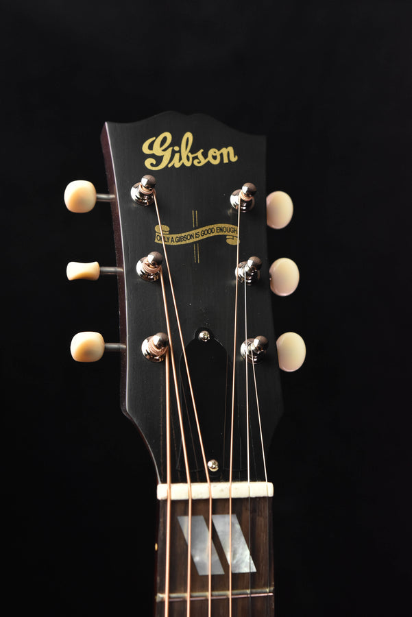 Gibson acoustic guitar headstock with Grover-style tuners and Gibson logo