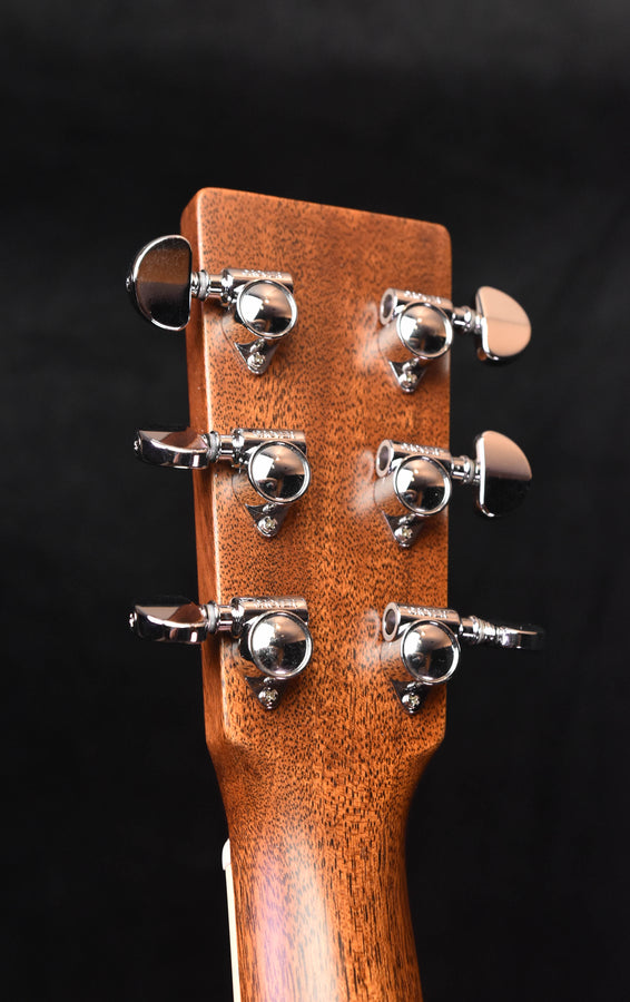 Martin HD-35 acoustic guitar headstock close-up with tuning keys and logo