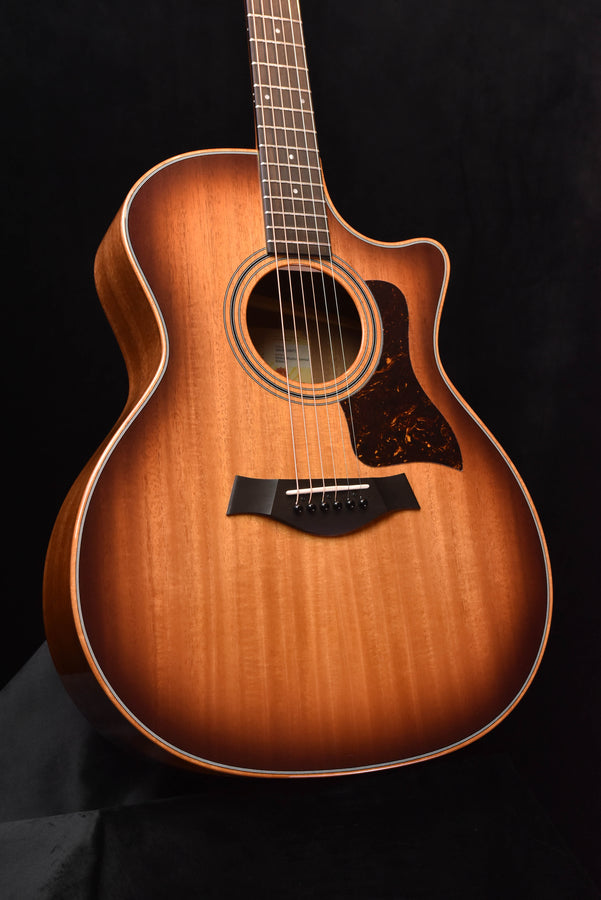 Taylor acoustic guitar body with amber sunburst finish and rosette sound hole