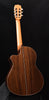 Cutaway classical guitar with dark striped wood body and natural top binding