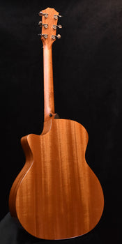 taylor acoustic guitar back with natural wood grain and curved body
