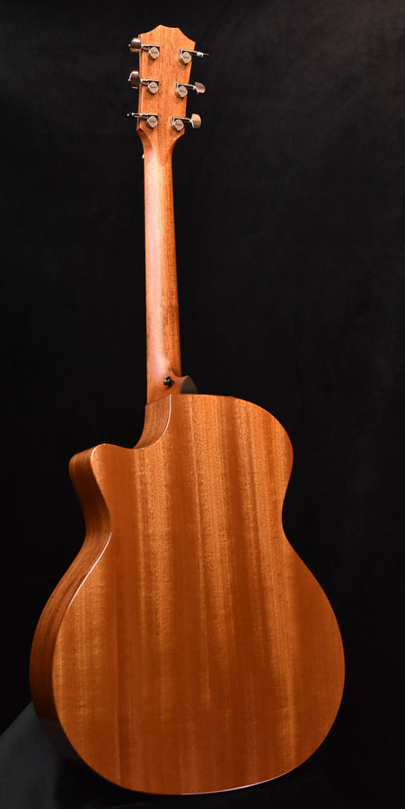 Taylor acoustic guitar back with natural wood grain and curved body
