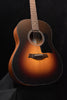 Sunburst acoustic guitar front with black pickguard and rosette sound hole