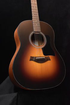 sunburst acoustic guitar front with black pickguard and rosette sound hole