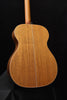 Acoustic guitar back with natural wood grain and center seam