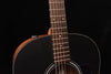 Acoustic guitar neck and upper body with frets and circular rosette sound hole