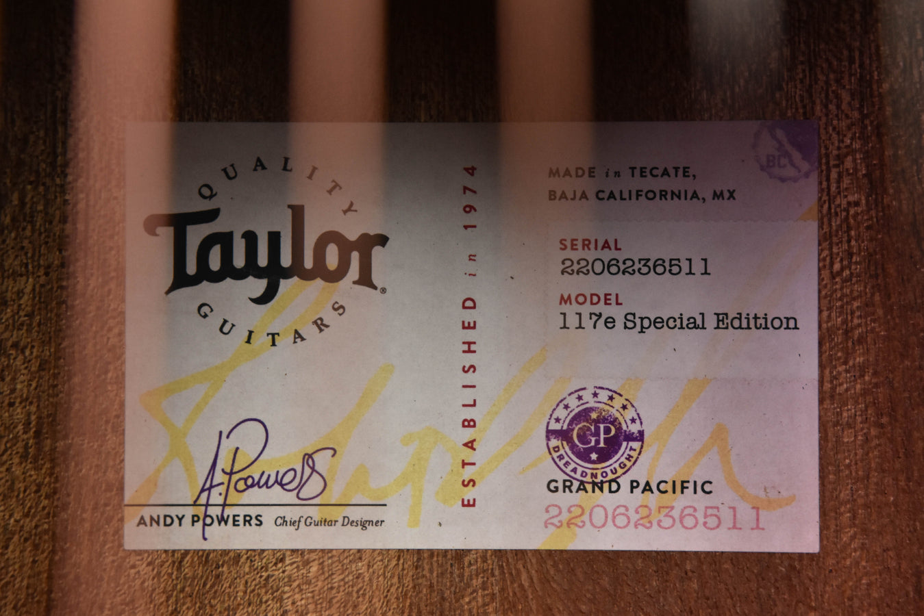 Taylor guitar label card showing Model 117E Special Edition and serial number