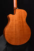 Back view of acoustic-electric crossover guitar, natural wood finish