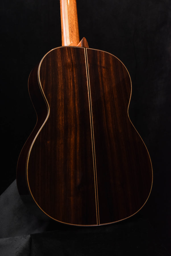 Classical guitar close-up of back center seam and natural wood grain