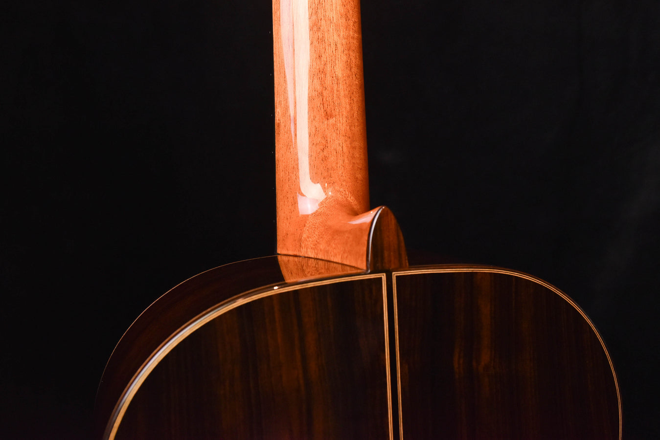 Classical guitar close-up of neck joint and top edge