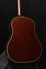 Brown acoustic-electric guitar body with cream binding and lower bout