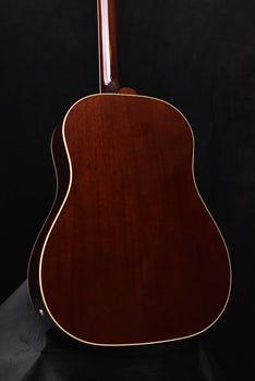 brown acoustic-electric guitar body with cream binding and lower bout