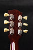 Gibson-branded acoustic-electric guitar headstock with six tuners