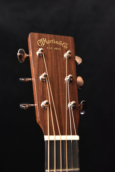 d-18 dreadnought acoustic guitar headstock with martin logo and tuning machines